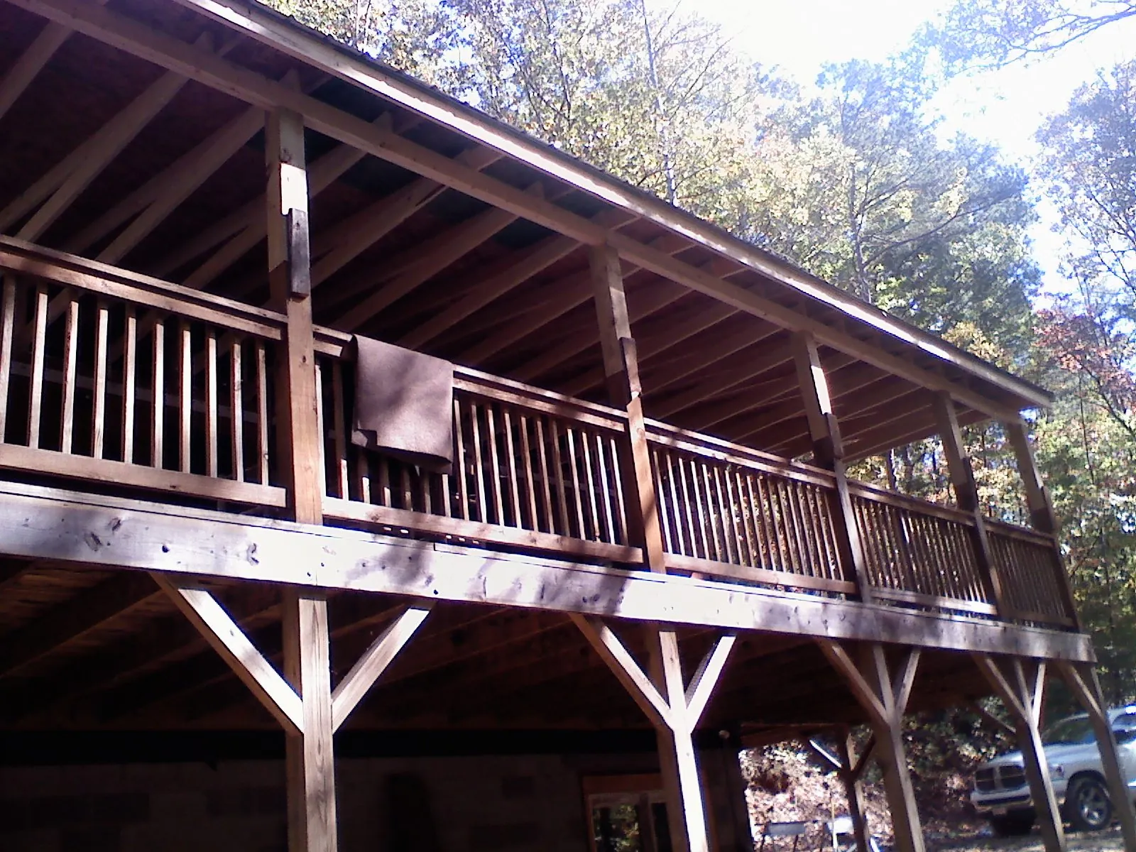 Timber framing under a new elevated porch and deck — Roof Leak Repair in Callensburg by Roofing Brothers